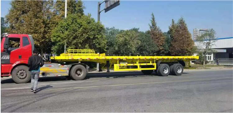 Two Axle 20FT 40FT Container Flatbed Semi Truck Trailer | Yangzhou Vulcan Machinery Manufacturing Co., Ltd